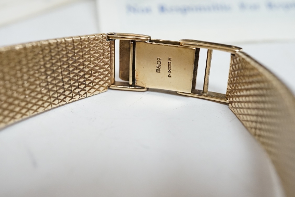 A lady's early 1970's 9ct gold Longines manual wind wrist watch, on an associated 9ct gold bracelet, gross weight 38 grams, with Longines box and pamphlet.